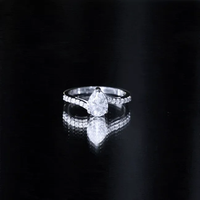 Pear Shape Moissanite Solitaire Bypass Engagement Ring